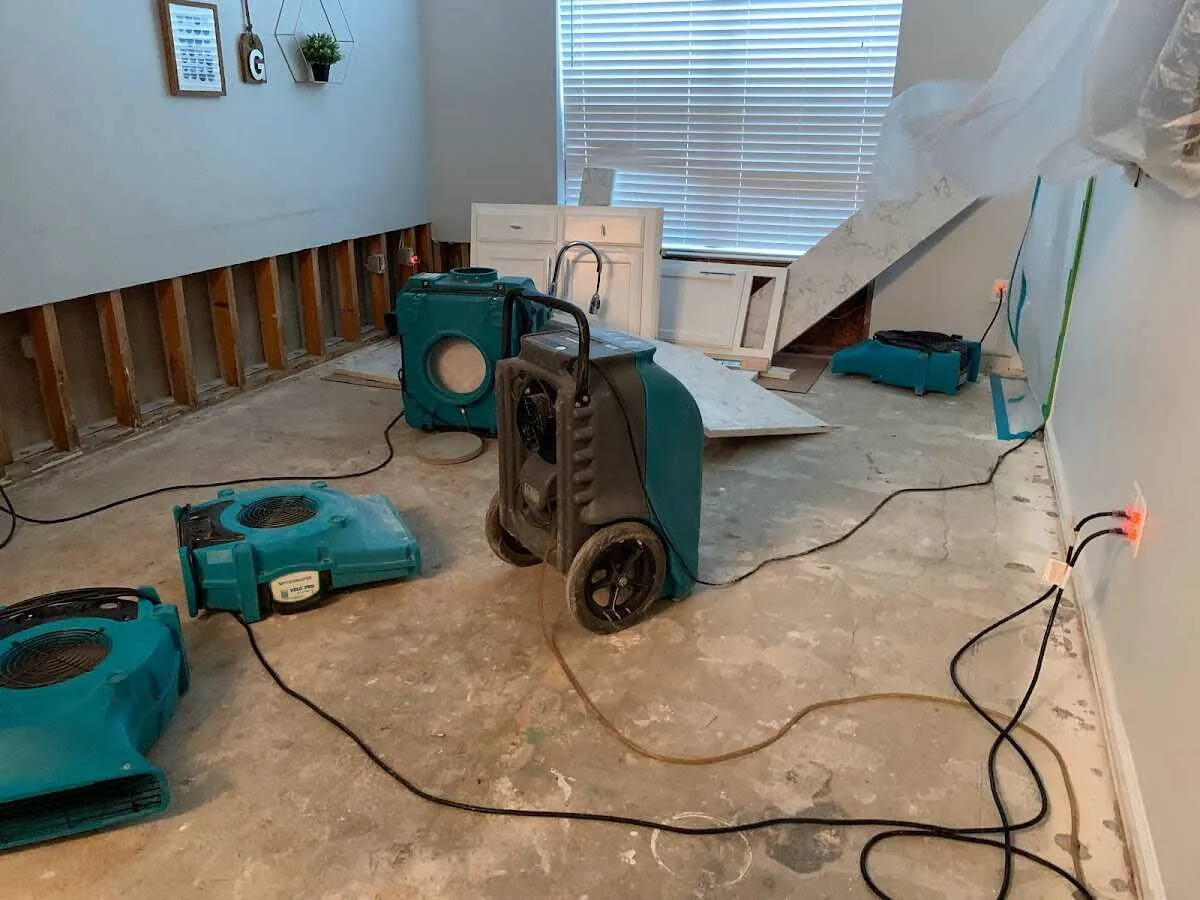 Dehumidifier in flood-cut room for Water Damage Restoration in Novi